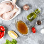 A dish of chicken dressing made with shredded chicken, breadcrumbs, onions, celery, and herbs, baked to golden perfection.