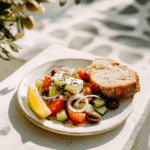 Famous Greek salad served on a plate with bread