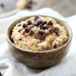 Protein cottage cheese cookie dough served in a rustic bowl with chocolate chips