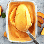 Homemade 3 ingredient peach sorbet served in a rustic bowl