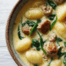 Creamy Italian Sausage & Gnocchi Soup in rustic bowl