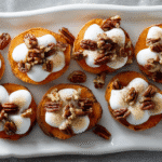 Sweet Potato Rounds with Spiced Pecans and Marshmallow Cream