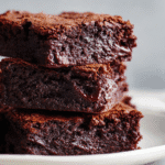 Dairy Free Double Chocolate Brownies on white plate close-up