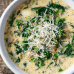 Parmesan Sausage Gnocchi Soup served in a bright white bowl