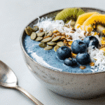 U3823717446 Bright And Colorful Smoothie Bowl Served In A Cer 7dc18b5f 3f13 434a 8c99 Ab9b7c4f0985 1