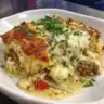 Cheesy ground beef and rice casserole dish ready to serve