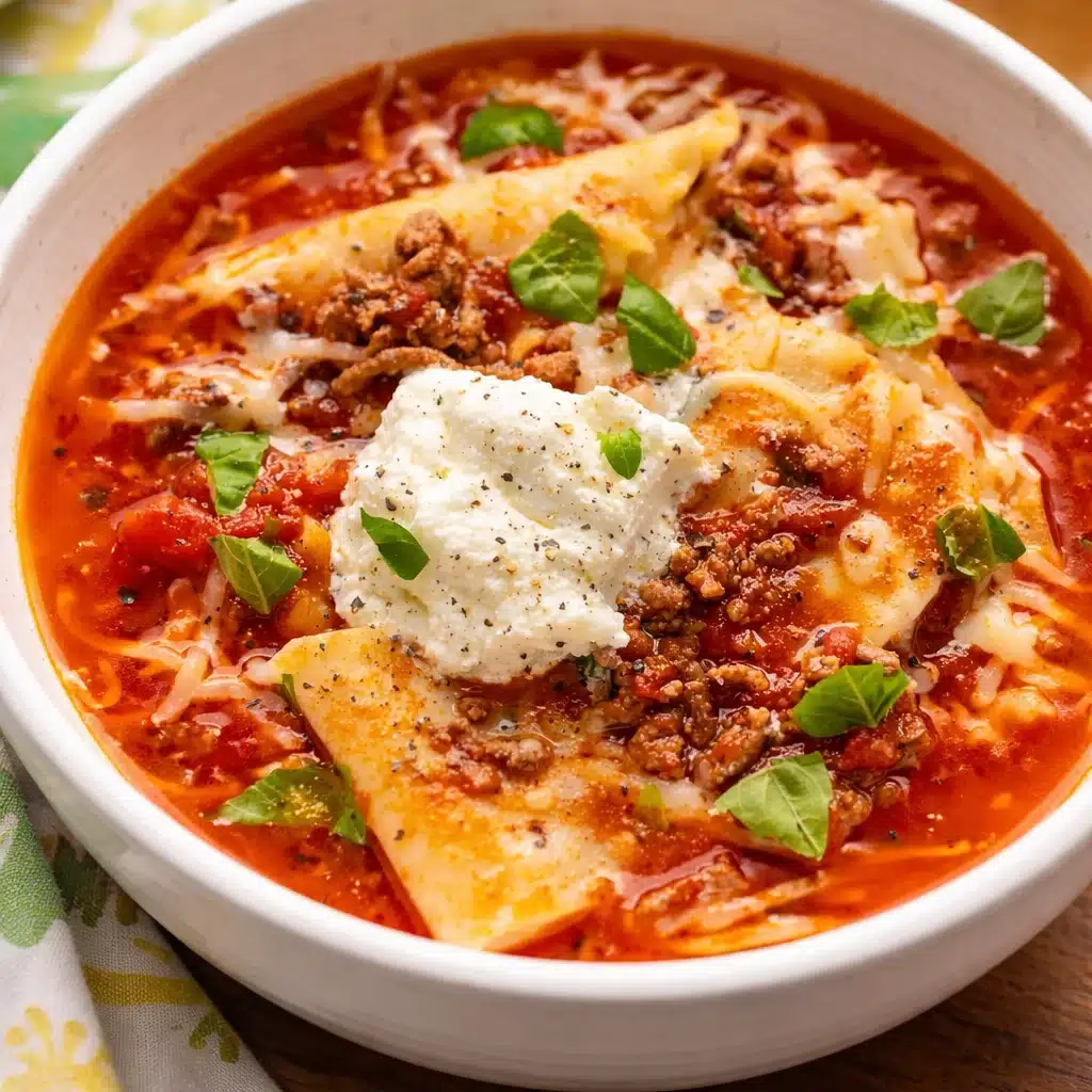 Delicious crockpot lasagna soup with noodles, ground beef, and three cheeses.