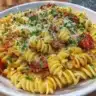 Creamy tomato garlic pasta with fresh herbs and a rich sauce