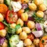 Colorful Mediterranean Chickpea Salad with vegetables and herbs