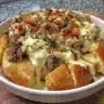 Delicious Philly Cheesesteak Bowl with steak, onions, and cheese