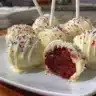 Delicious Red Velvet Cake Pops beautifully decorated for a celebration