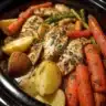 Slow Cooker Garlic Butter Chicken with colorful veggies in a bowl
