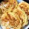 Air fryer cabbage steaks served with seasoning