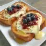Delicious air fryer cottage cheese toast with blueberry and honey topping