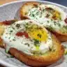 Air fryer poached eggs served on crispy toast with garnish