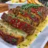 Delicious Air Fryer Skinny Meatloaf served on a plate with vegetables.