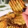 Air fryer spicy dill pickle potato chips served on a plate