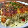 Angel Chicken and Rice Casserole topped with herbs and cheese for a comforting meal
