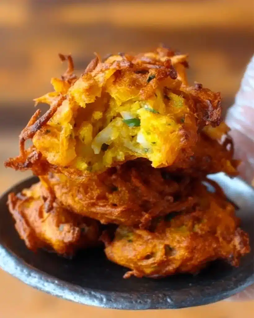 Crispy air fryer onion fritters served with dipping sauce