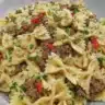 Cajun Cream Cheese Alfredo Bowties served with spiced ground beef