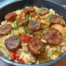 Cajun Sausage and Rice Skillet dish with colorful ingredients in a pan