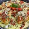 Delicious chicken casserole topped with cheese and vegetables