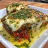 Delicious classic Greek eggplant moussaka layered with rich flavors.