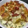 Delicious creamy chicken bake served with vegetables and cheese