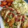 Delicious creamy herb chicken served with mashed potatoes and honey glazed carrots