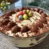 Easter Dirt Cake Casserole with chocolate layers and gummy worms on top
