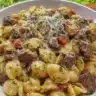 Easy healthier creamy garlic beef pasta dish served in a bowl.