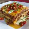 Delicious easy taco casserole baked with cheese and topped with fresh ingredients