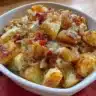Delicious fried potatoes and onions served as a side dish