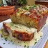 Garlic Parmesan Chicken Meatloaf served with herbs and spices