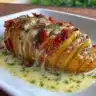 Deliciously crispy and tender Hasselback Potatoes topped with herbs and spices