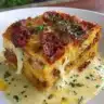 Delicious homemade lasagna with layers of cheese, meat, and sauce.