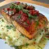 Deliciously cooked Marry Me Salmon dish garnished with herbs