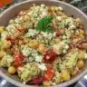 Mediterranean Chickpea Feta Salad with colorful vegetables and feta cheese