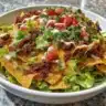Delicious Simple Doritos Taco Salad served in a bowl with vibrant toppings