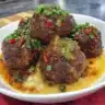 Sticky Mongolian Beef Meatballs served on a plate with garnishes