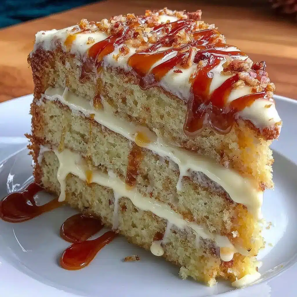 Delicious vanilla cake with honey buttercream frosting on a white plate