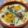 Air fryer breakfast tortilla baked eggs served in a colorful dish