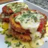 Air fryer eggplant parmesan dish served in a plate with garnishes
