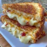 Crispy air fryer grilled cheese sandwich with melted cheese