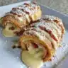 Air Fryer Monte Cristo Roll Ups ready to serve with dipping sauce