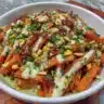 Delicious Asian carrot salad with fresh vegetables and sesame dressing