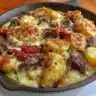 Cheesy One-Pot Beef and Potatoes dish served in a bowl