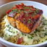Delicious salmon rice bowl with fresh vegetables and rice for a cozy fall meal.