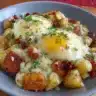 Delicious Potato and Cheese Hash (Frika) served in a skillet