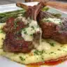 Juicy lamb chops seasoned and grilled to perfection on a plate